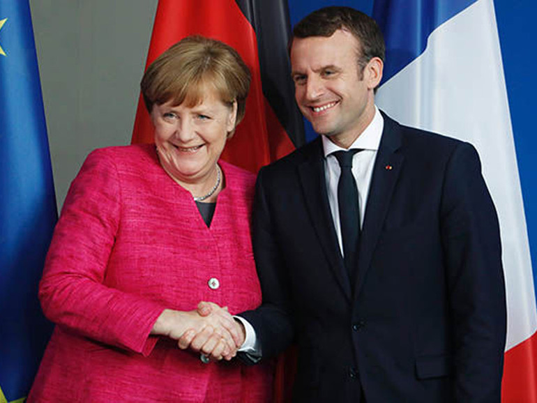 Merkel e Macron vogliono l'esercito europeo Merkel e Macron vogliono l'esercito europeo