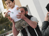Siria: il sorriso del piccolo Mustafà che abbraccia l’Italia
