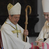 Patriarca che poi invita don Renato ad accomodarsi sulla cattedra