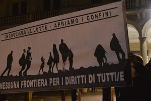 Cartellone a favore dell'abbattimento delle frontiere