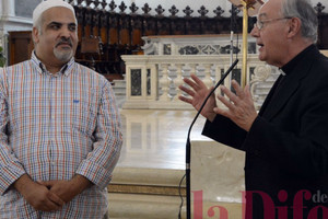 Il vicario generale don Paolo Doni e l'imam Layachi